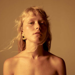 Alice Phoebe Lou portrait photographed in warm golden light for independent music feature