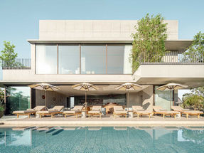 Rooftop pool terrace at TRUNK Hotel Yoyogi Park in Tokyo with sun loungers and modern architectural design