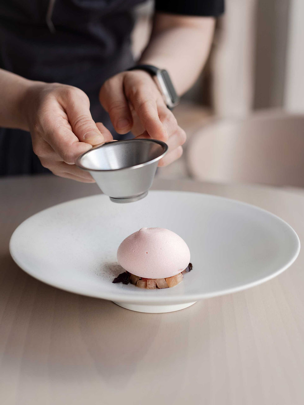 Plated dessert at Sollip London with delicate pink mousse and refined presentation