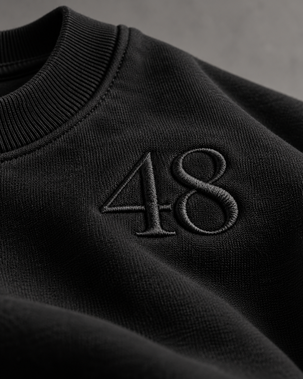 Broderie directe noire sur sweat premium personnalisé à Paris en 24h – Maison 48