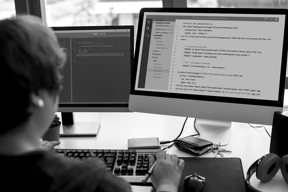 Person looking at a screen with code on it.