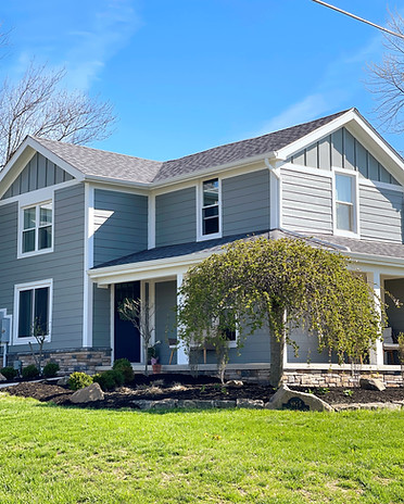 A house with gray James Hardie fiber cement luxury siding to show this option to our Englewood customers
