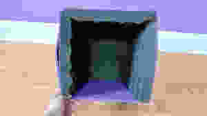 Placing the foam in a DIY Portable Sound Booth