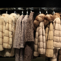The various fur coats at the store