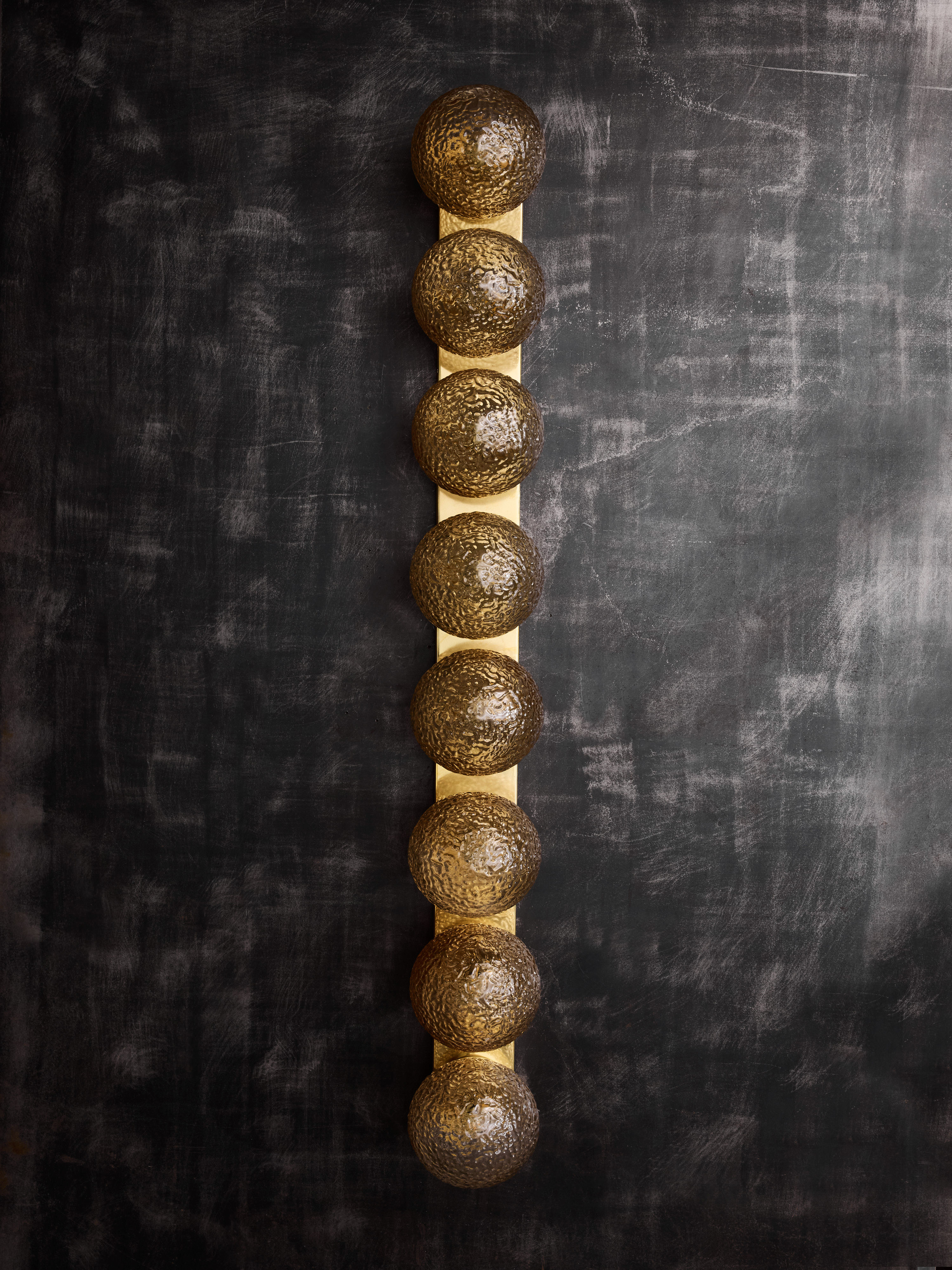 Pair of Vertical Brass and Smoked Textured Glass Globe Wall Sconces