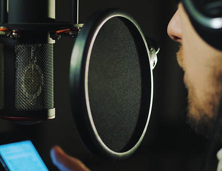 close-up-man-singing-recording-studio.jpg