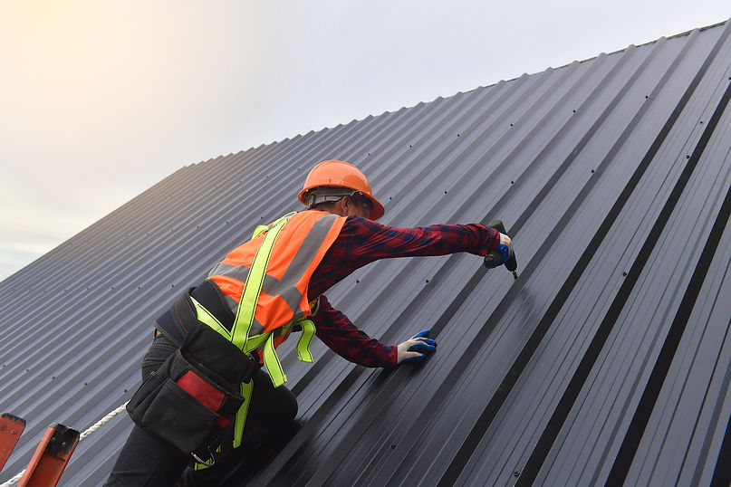background Roofer worker in protective uniform wear and gloves,Roofing tools,installing ne