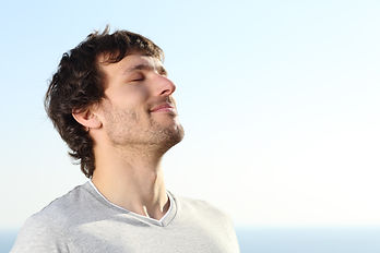 Close-up-of-a-man-doing-breath-exercises
