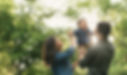Parents playing with young child