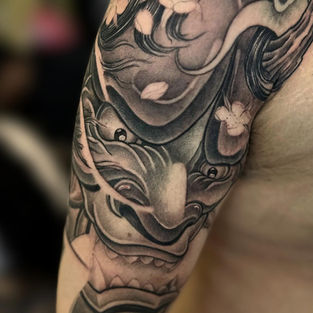 full sleeve Japanese tattoo of hanya mask 