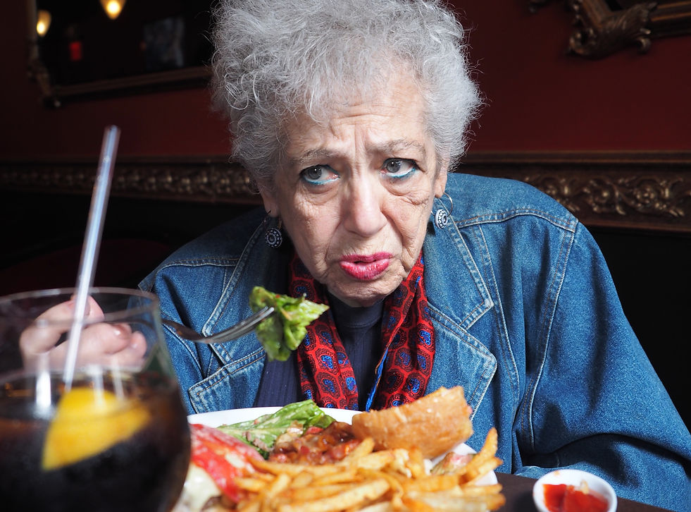 Cyrille eats lunch at the assisted living facility,