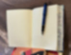 Blue Marbled Journal displayed open with a pen