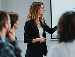businesswoman-giving-presentation.jpg