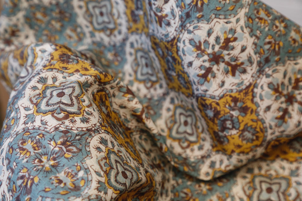Cotton digital interpretation of block print draped shot in studio using natural lighting.