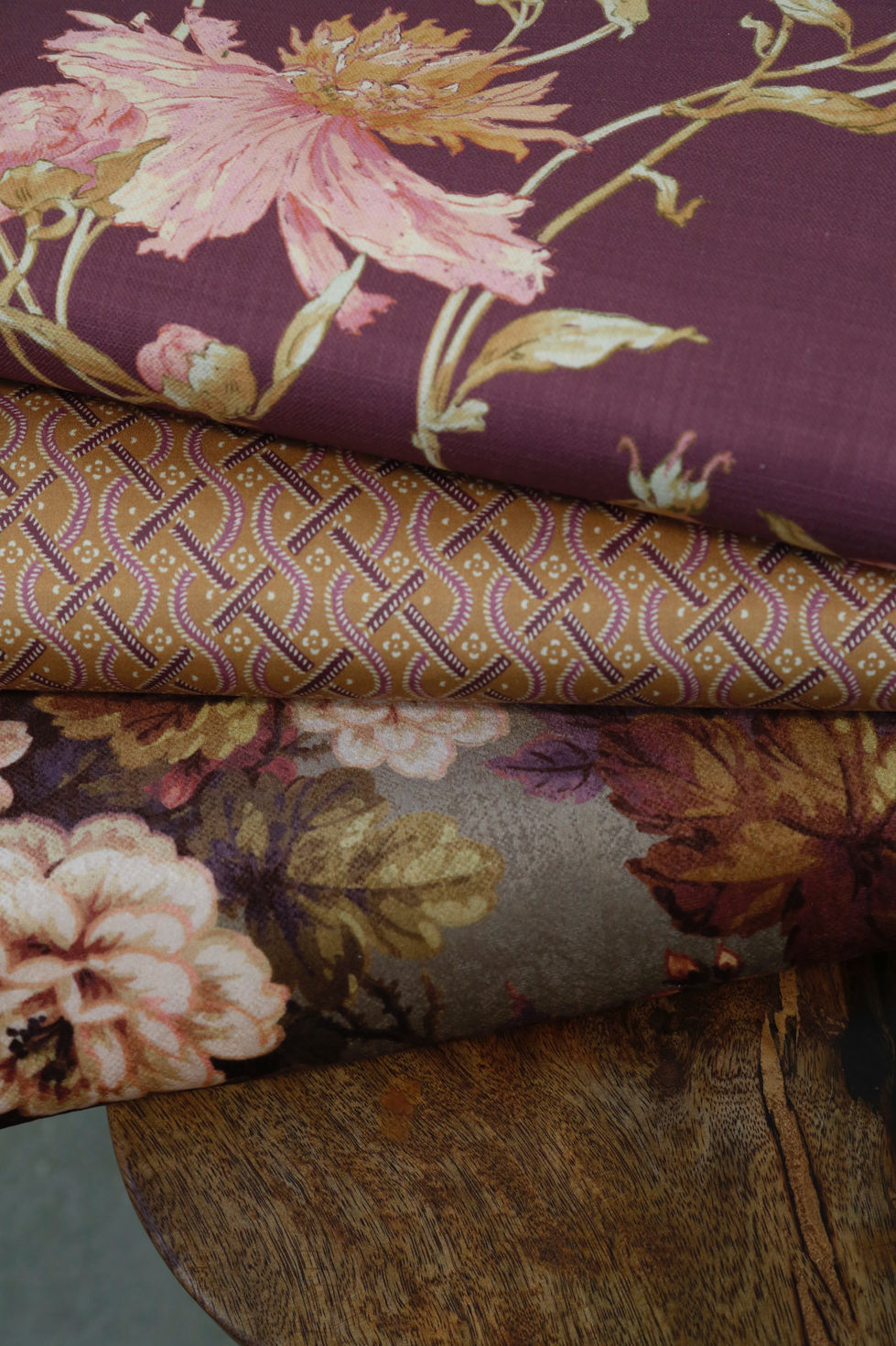 Studio product folded fabric shot featuring maximalism florals and coordinate. 