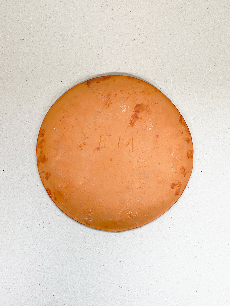 Thumbnail: Orange ceramic plate with green glaze