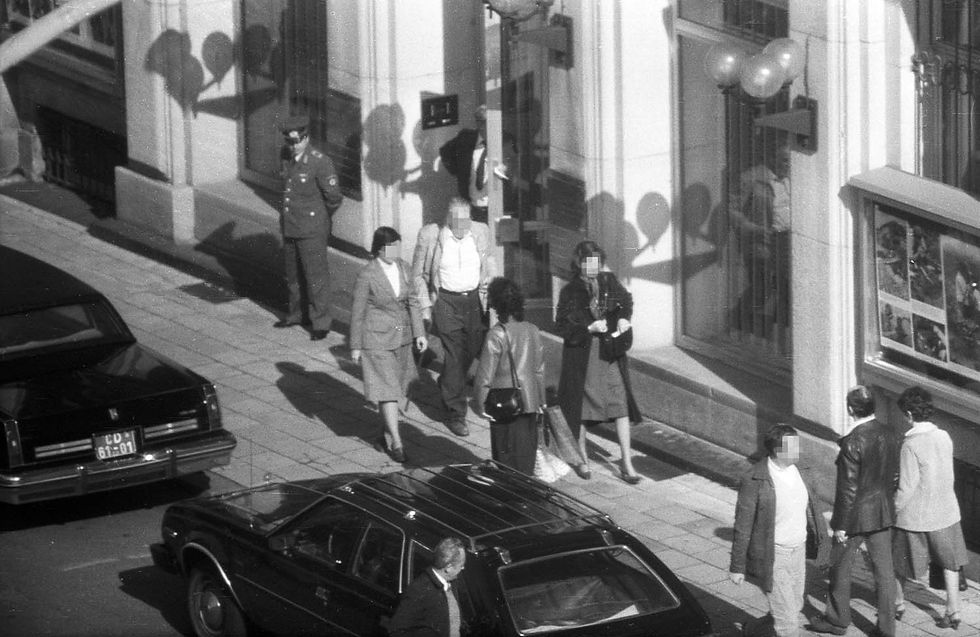 Stasi surveillance photo of people going in and out of the U.S Embassy in East Berlin. Digitally archived by German artist Simon Meneer, 2019 (https://simonmenner.com/_sites/SurveillanceComplex/StasiImages/STASI-Embassy.html)