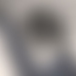 Consumer scanning a NFC tag on pair of sweat pants