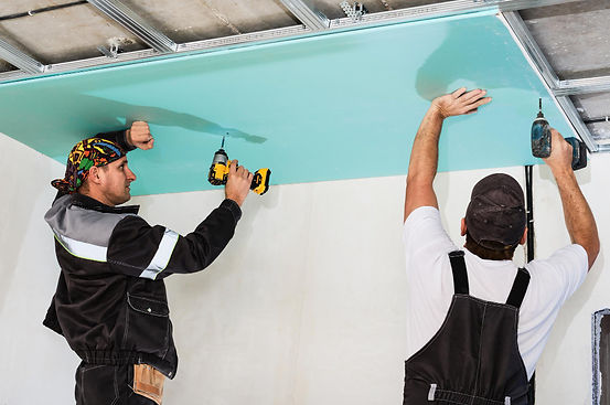 plasterboard-installers-men-assembling-drywall-false-ceiling-simple-affordable-renovation-