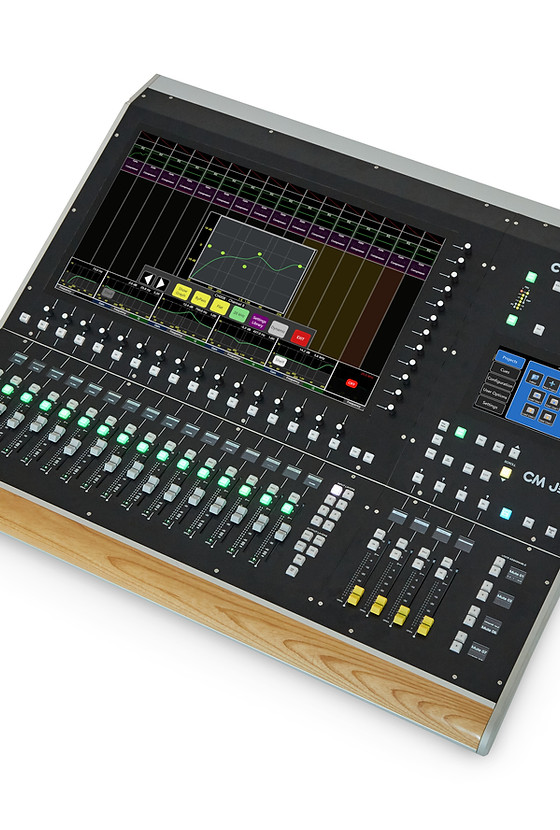 Cadac CM-J50 digital audio mixing console — front view showing 20 motorised faders and 23.5-inch touchscreen