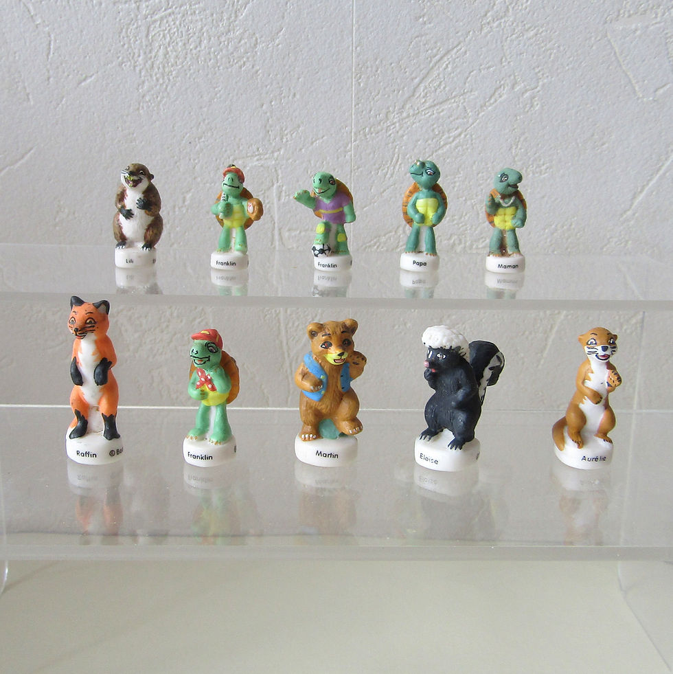 Fèves en porcelaine mate de la série Franklin (2004), représentant les personnages Aurélie, Raffin, Martin, Lili, Eloise