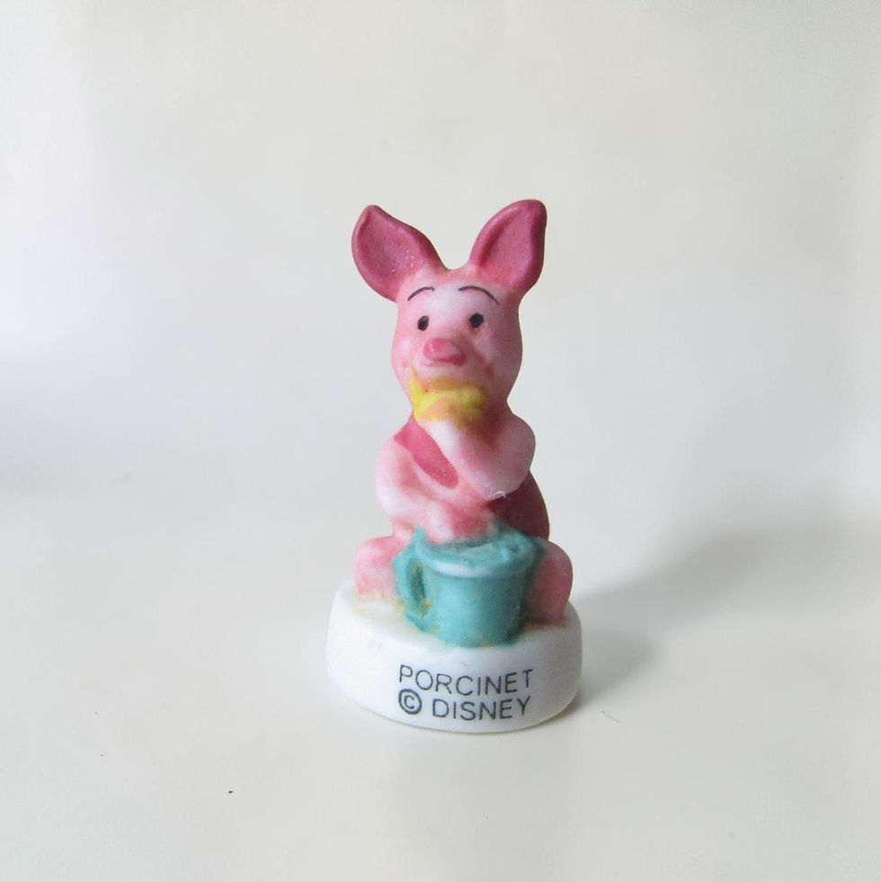 Fèves mates en porcelaine Winnie l’Ourson (Éditions Arguydal, 2004) : série de 10 figurines représentant Grand Gourou