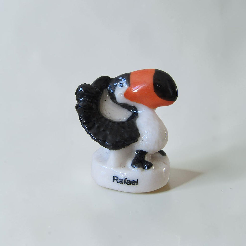 Miniature : Fèves en porcelaine brillante Rio 2 (2010) Éditions Prime représentant 12 personnages du film : Blu, Perla, Pedro, Tiago,