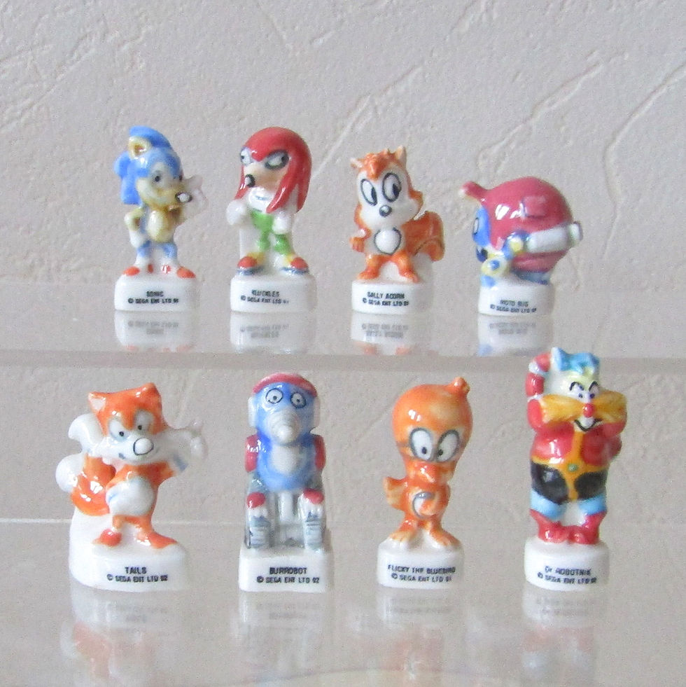 Série de 8 fèves brillantes en porcelaine « Sonic Sega » éditée par Arguydal en 1997, représentant Sonic, Tails, Knuckles, Dr