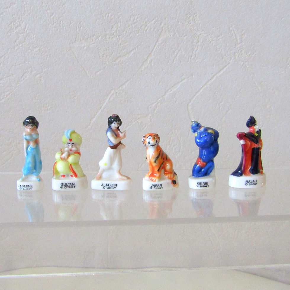 Série de 6 fèves brillantes en porcelaine Aladdin (Éditions Arguydal, 1994) représentant Jasmine, Aladdin, Rajah, Jafar