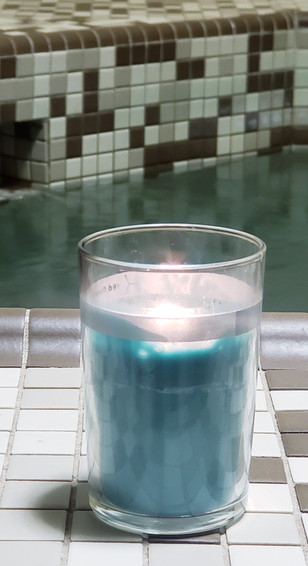 ocean candle by red flower