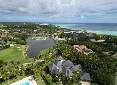 Villas and greenery in a Dominican neighborhood, aerial photo