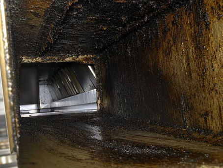Exhaust Hood Grease Buildup: A Kitchen Fire Hazard