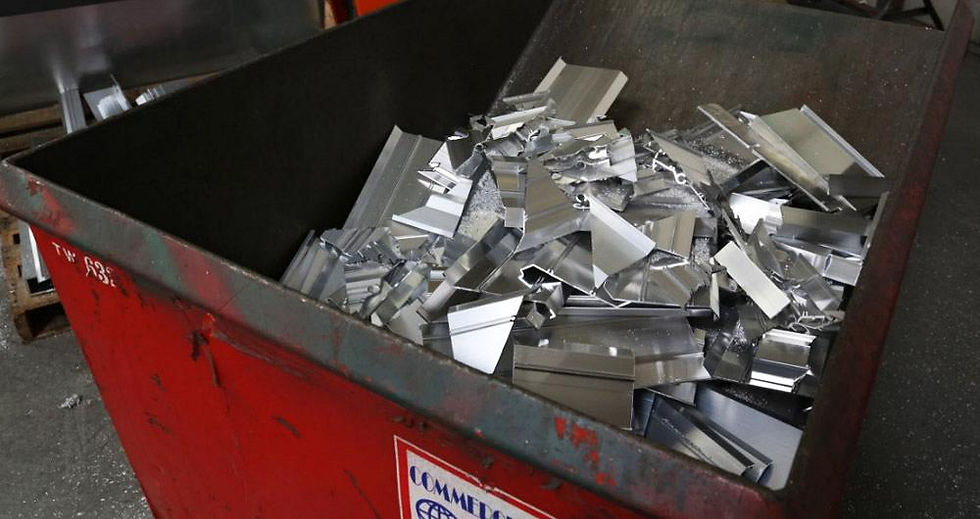 large metal container filled with scrap