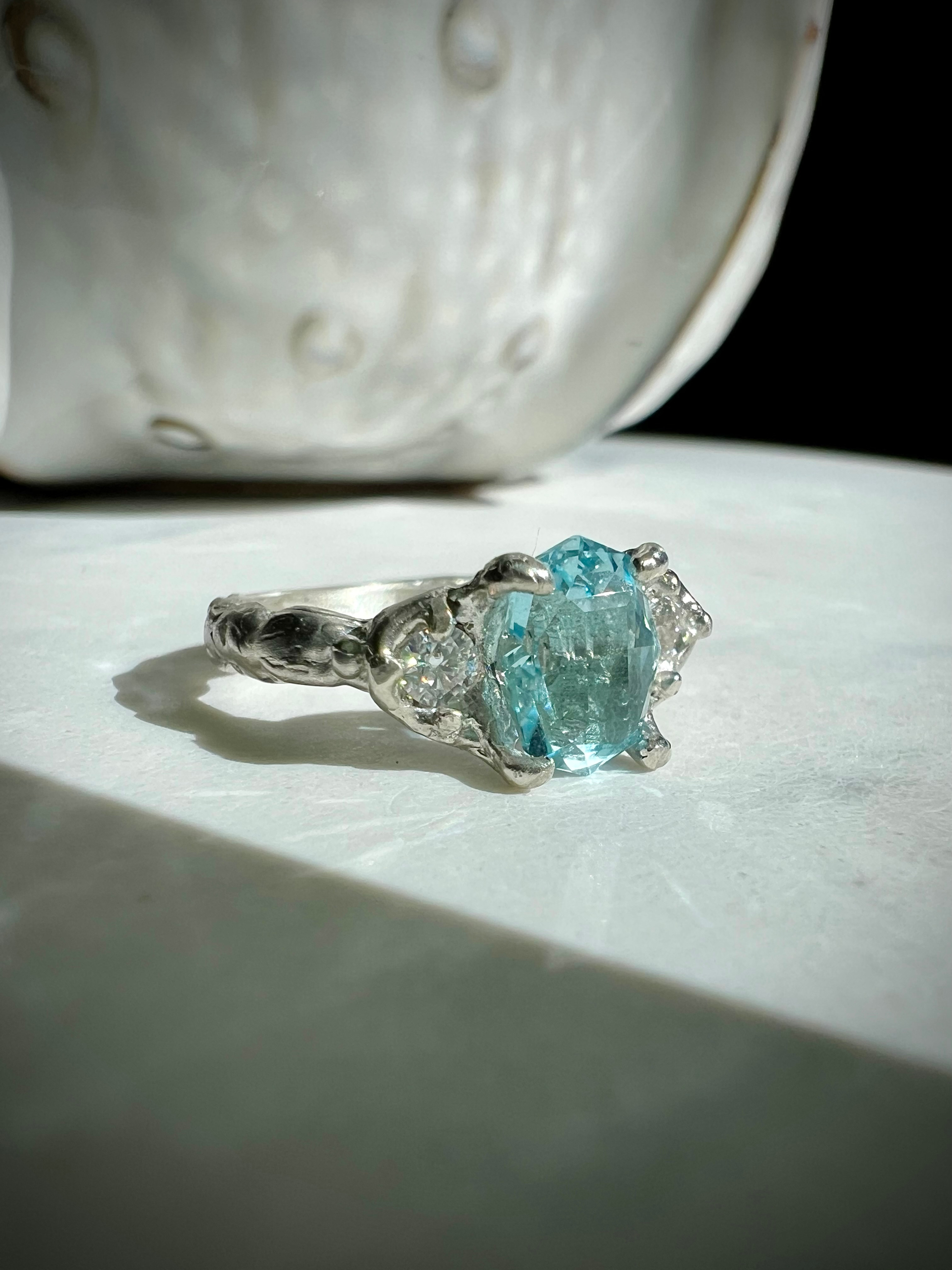 Sterling silver ring with aquamarine and moissanites, handmade by Jewel Sisters