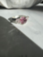 andcrafted silver ring featuring pink sapphires and Malaya garnet gemstone by Jewel Sisters.