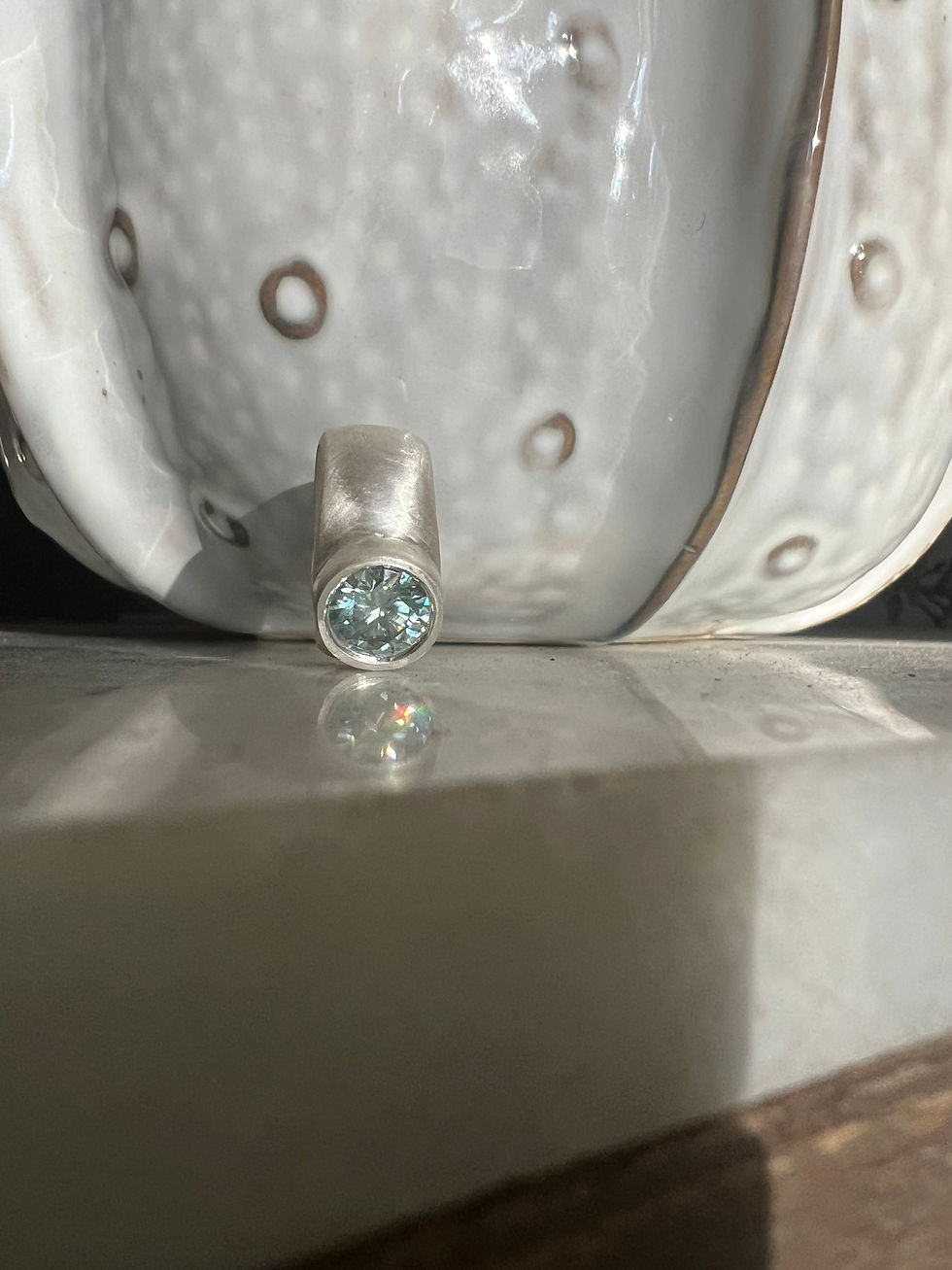 Thumbnail: Modern sterling silver ring with teal moissanite, solid chunky design handcrafted in Australia.
