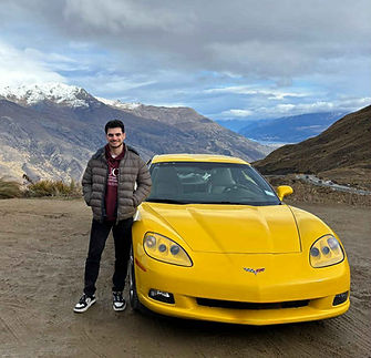 Yellow Corvette on top of the Crown Range