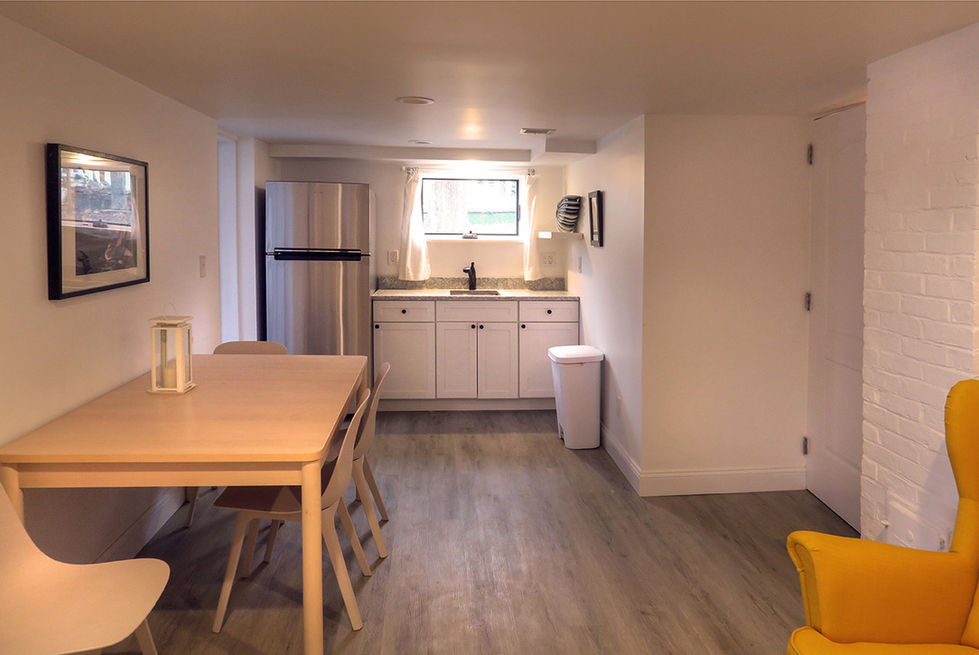 Lower Level with art studio to left and support
for Barbecue with sink/fridge.