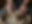 A-close-up-shot-of-hands-shaping-clay-on-a-pottery-wheel-in-a-workshop-setting-with-profes