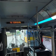 A view inside the headset showing a highly accurate 3D bus interior