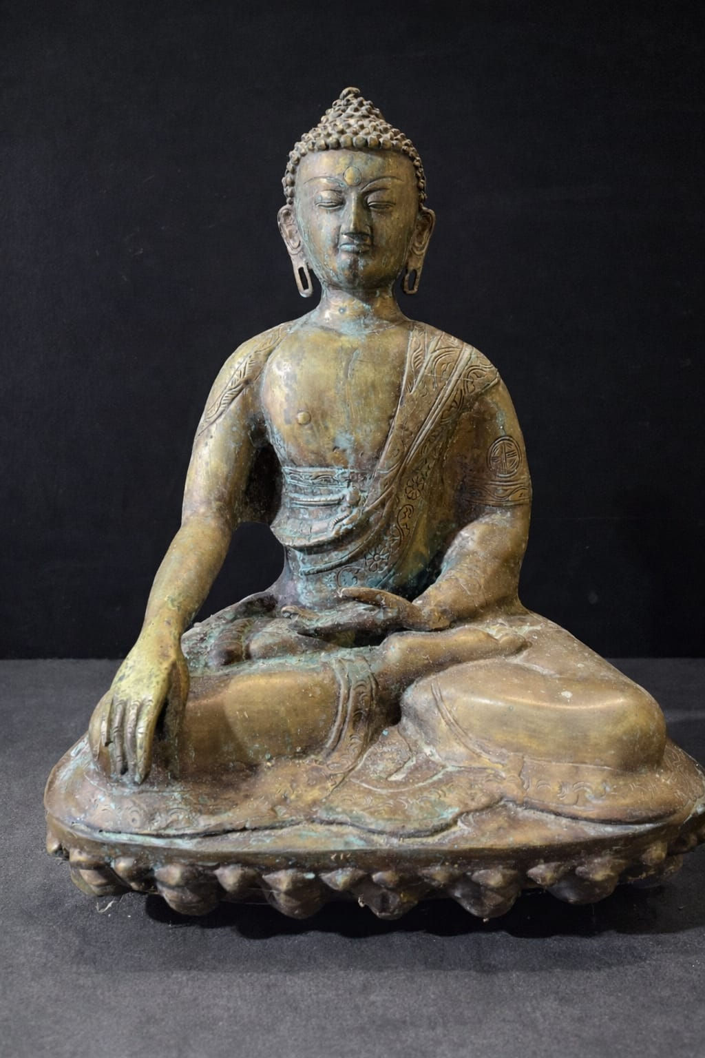 Antique Tibetan gilt bronze Buddha statue seated in meditation on lotus base