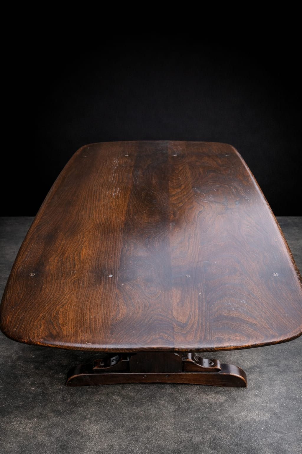 Close-up of aged solid wood plank top on antique refectory table