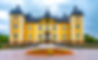 Mansion house entrance. Castle palace with gothic facade.jpg
