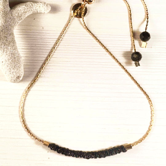 PAAROT - Collection Intemporelle - Bracelets Tissés. Finition acier inoxydable plaqué or. Fermeture Perle Coulissante.