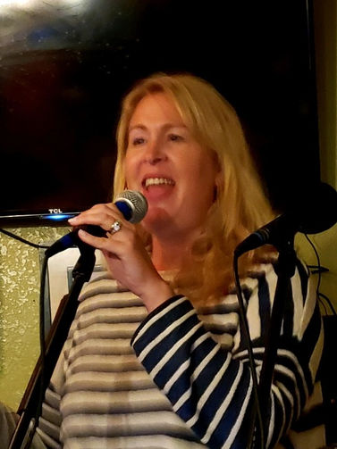Photo of Nicole Miele, of Wild Honey, performing