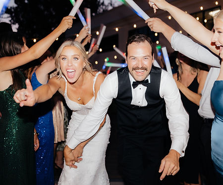 Wedding send-off at Homestead Resort in Midway, Utah, near Park City, with bride and groom surrounded by guests and glowing party lights.