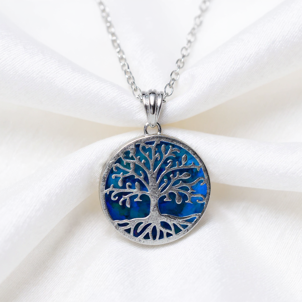 Tree of life silver pendant with custom ash and opal inlay.
