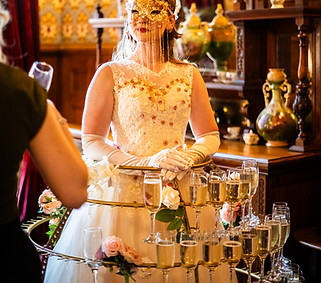 Book a living champagne glass meet and greet performer for your corporate event or wedding