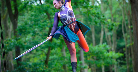 Book a unique aerial hula hoop act. High end corporate entertainment.