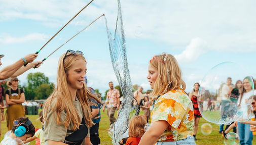 Hire a bubbleologist bubble performer.